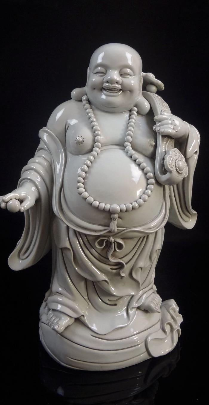 《何朝宗款》如意布袋佛