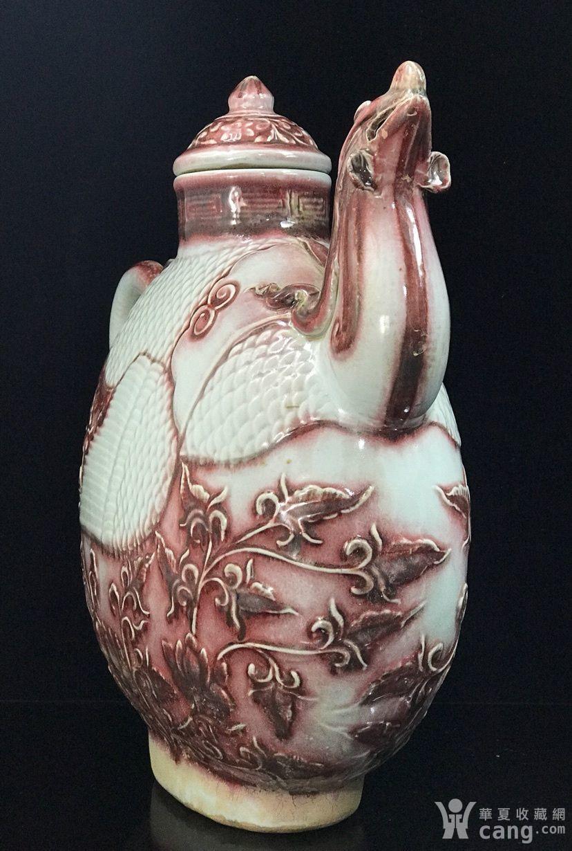 元釉里红雕刻凤头壶