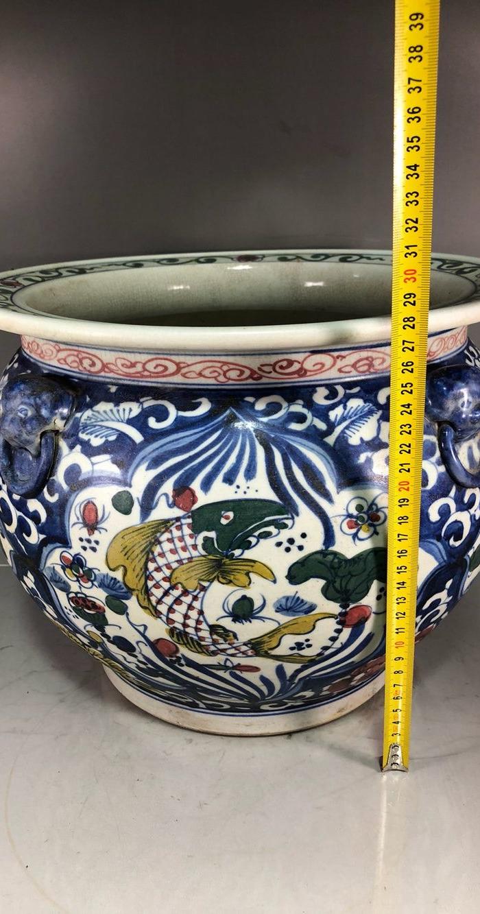 华夏古玩城 瓷器 其它 > 元代五彩开片鱼藻纹兽头罐